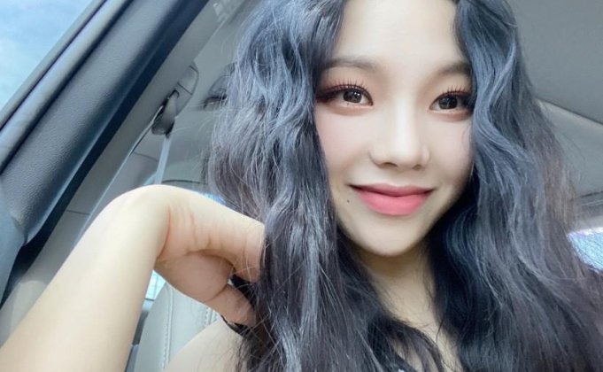 她出道后以怎样风格迅速获得知名度?Yu Ji Min刘知珉隶属哪个女团成员?